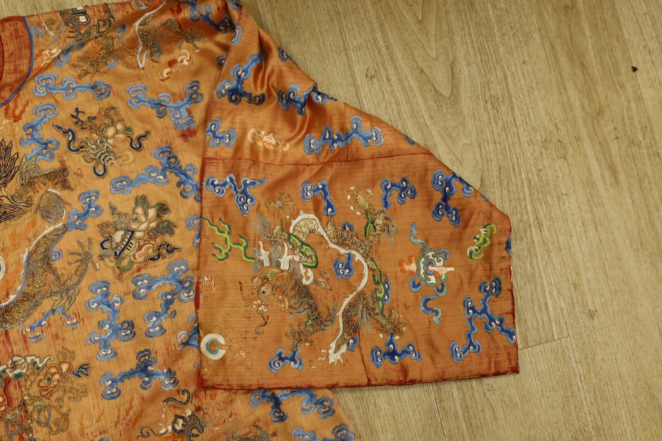 A Chinese embroidered silk dragon robe, late Qing Dynasty